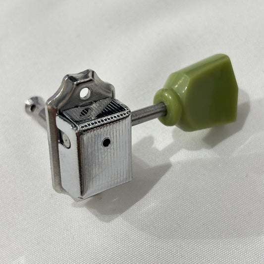 Chrome Keystone guitar tuner / machine head with green buttons on a white background