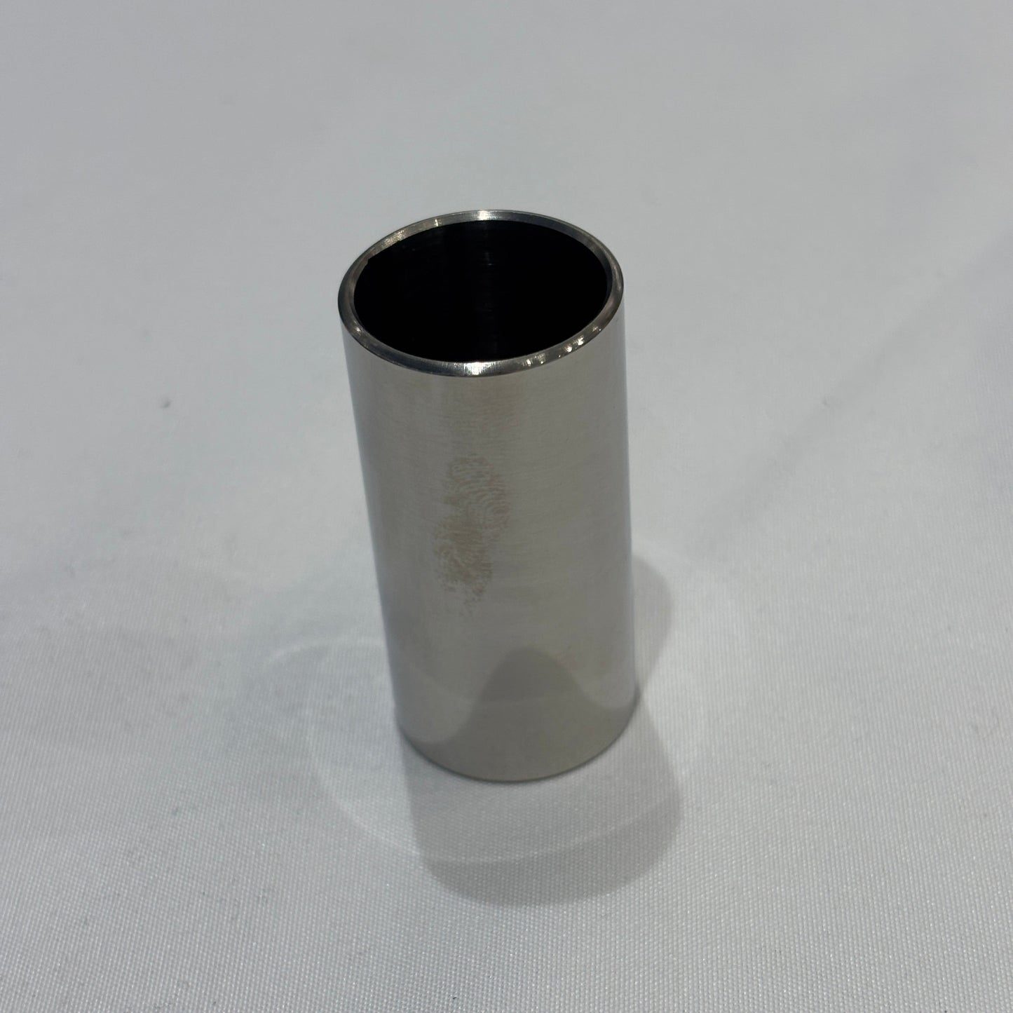 51mm Steel Guitar Slide standing upright on a white background.