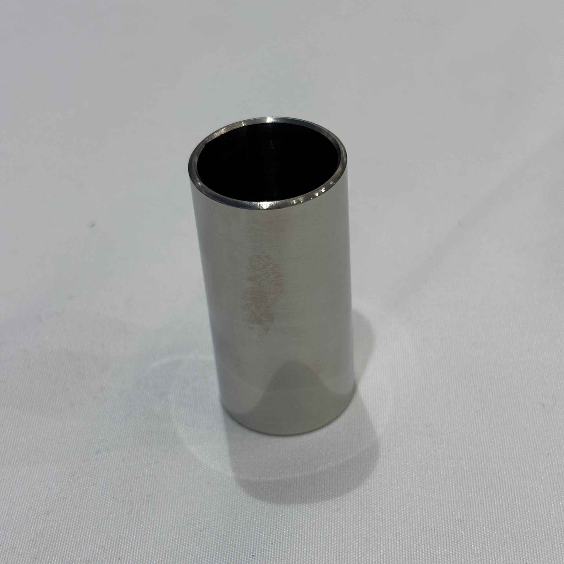51mm Steel Guitar Slide standing upright on a white background.