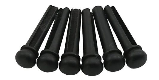 Set of Ebony Guitar Bridge Pins on a white background