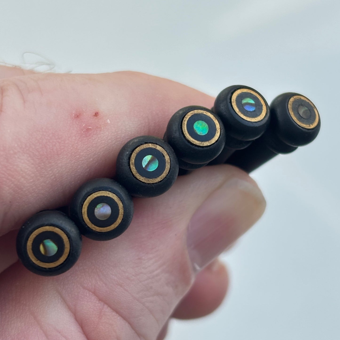 6 Ebony Acoustic Guitar Bridge Pins - Brass Ring & Abalone Dot Inlays | Guitars Limited