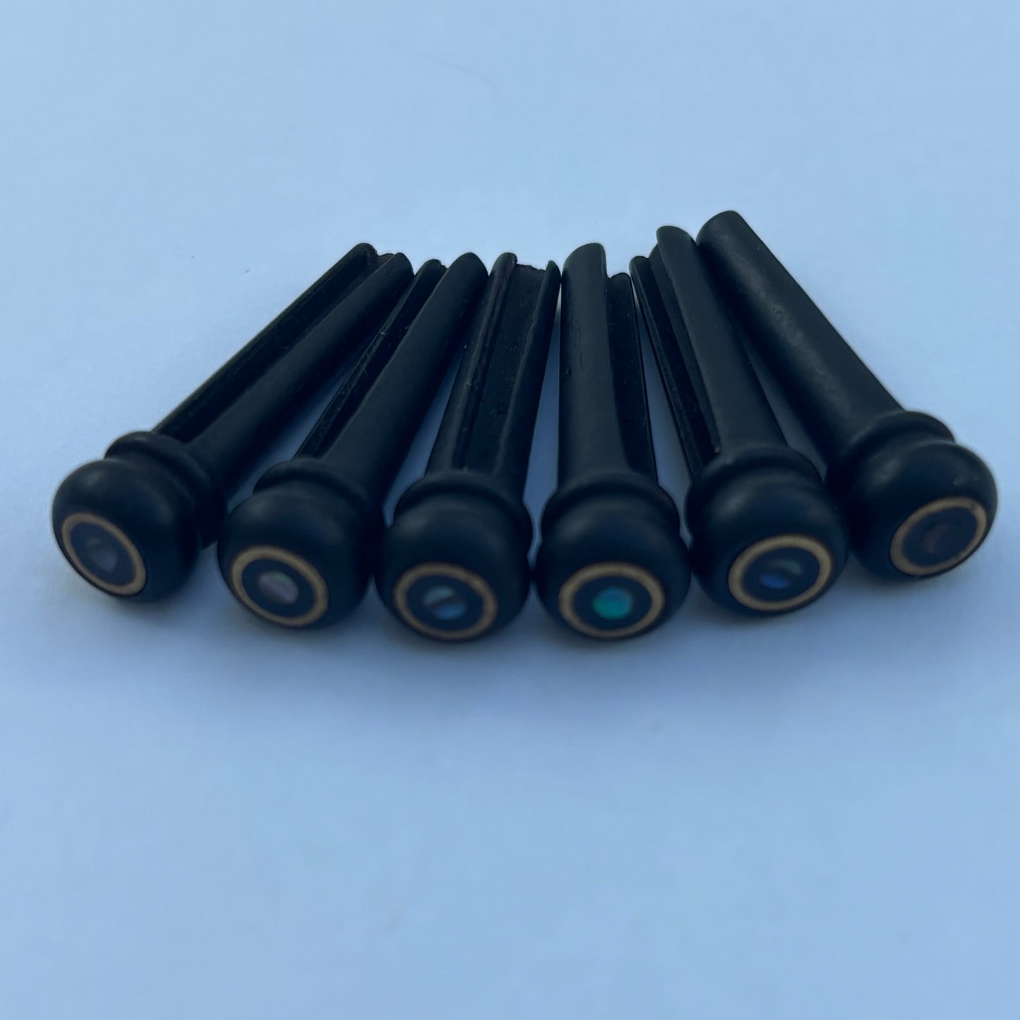 6 Ebony Acoustic Guitar Bridge Pins - Brass Ring & Abalone Dot Inlays | Guitars Limited