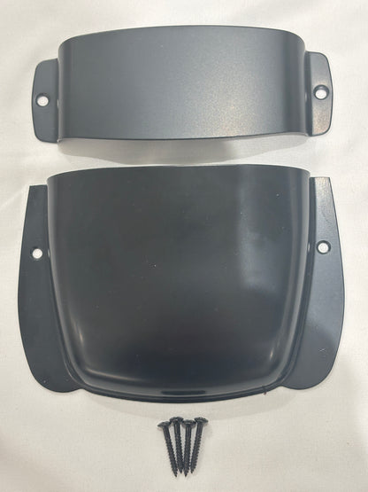 Black Bass Guitar Bridge and Pickup Covers on a White background.