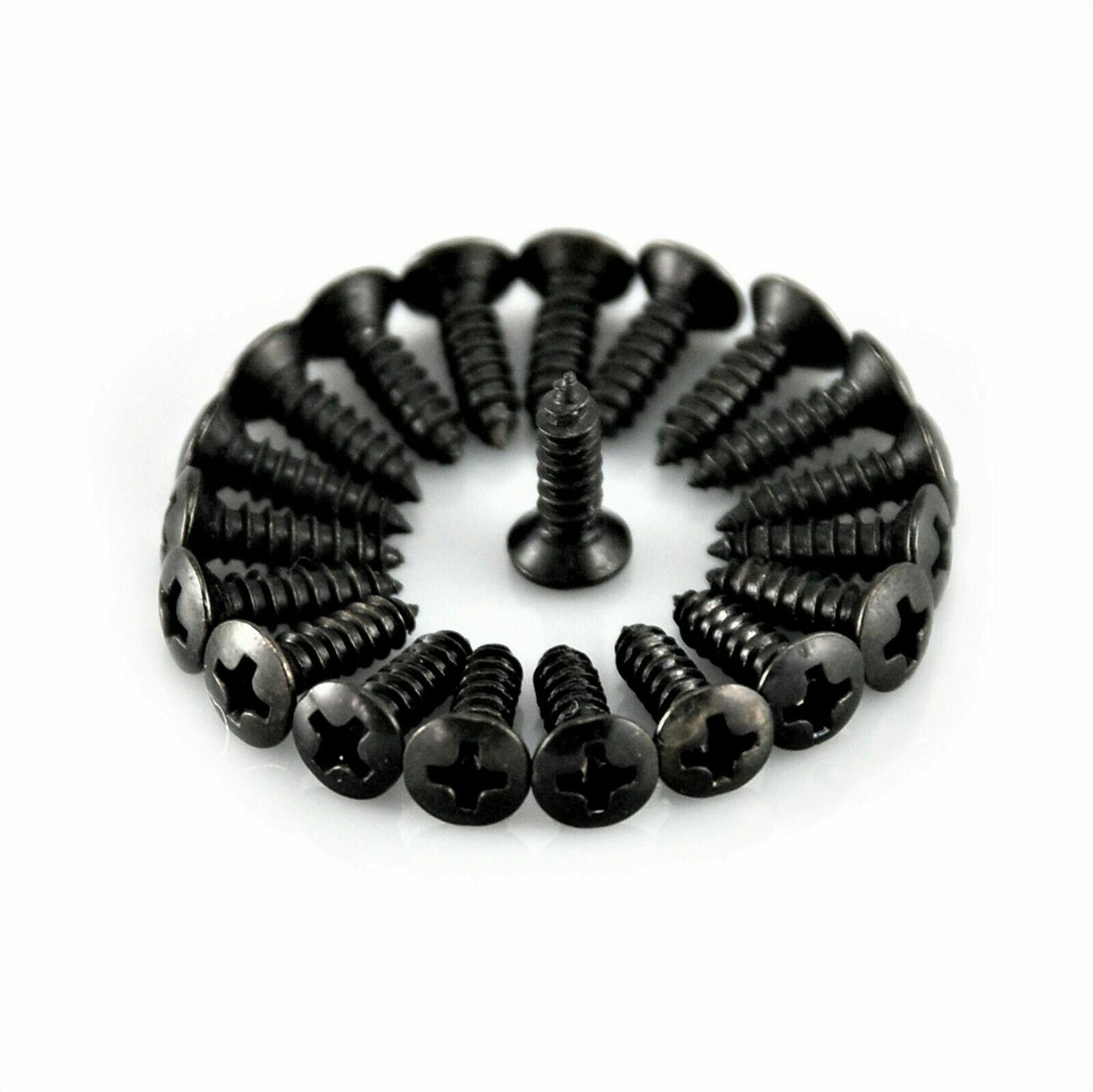 Circular arrangement of Black Guitar Pickguard screws screws on a white background.