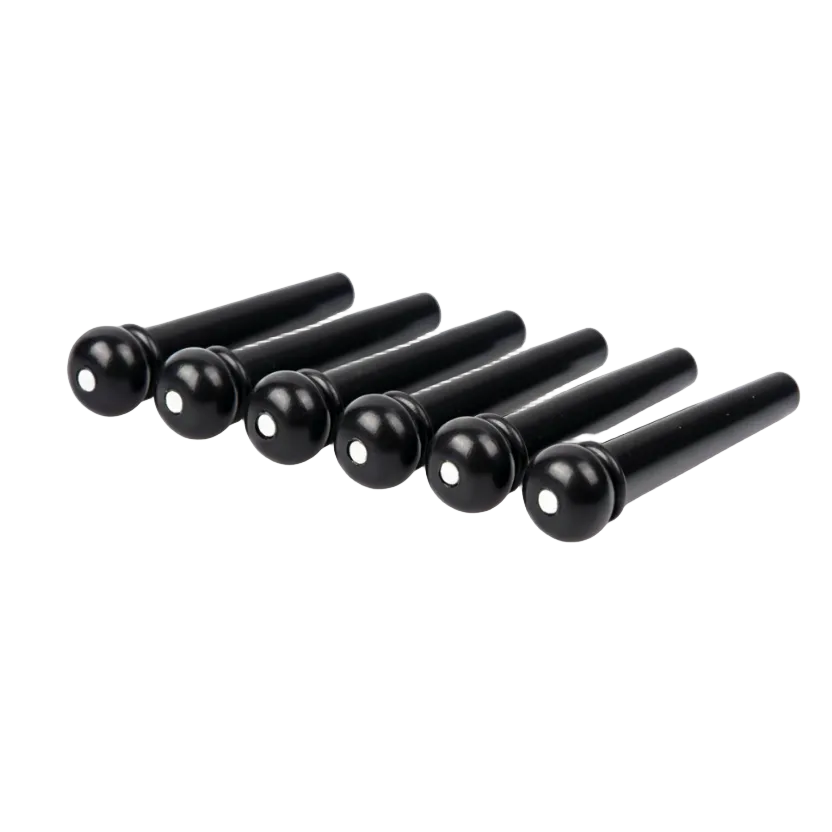 Two black plastic-Acoustic Guitar Bridge Pins with White dots on a white background.
