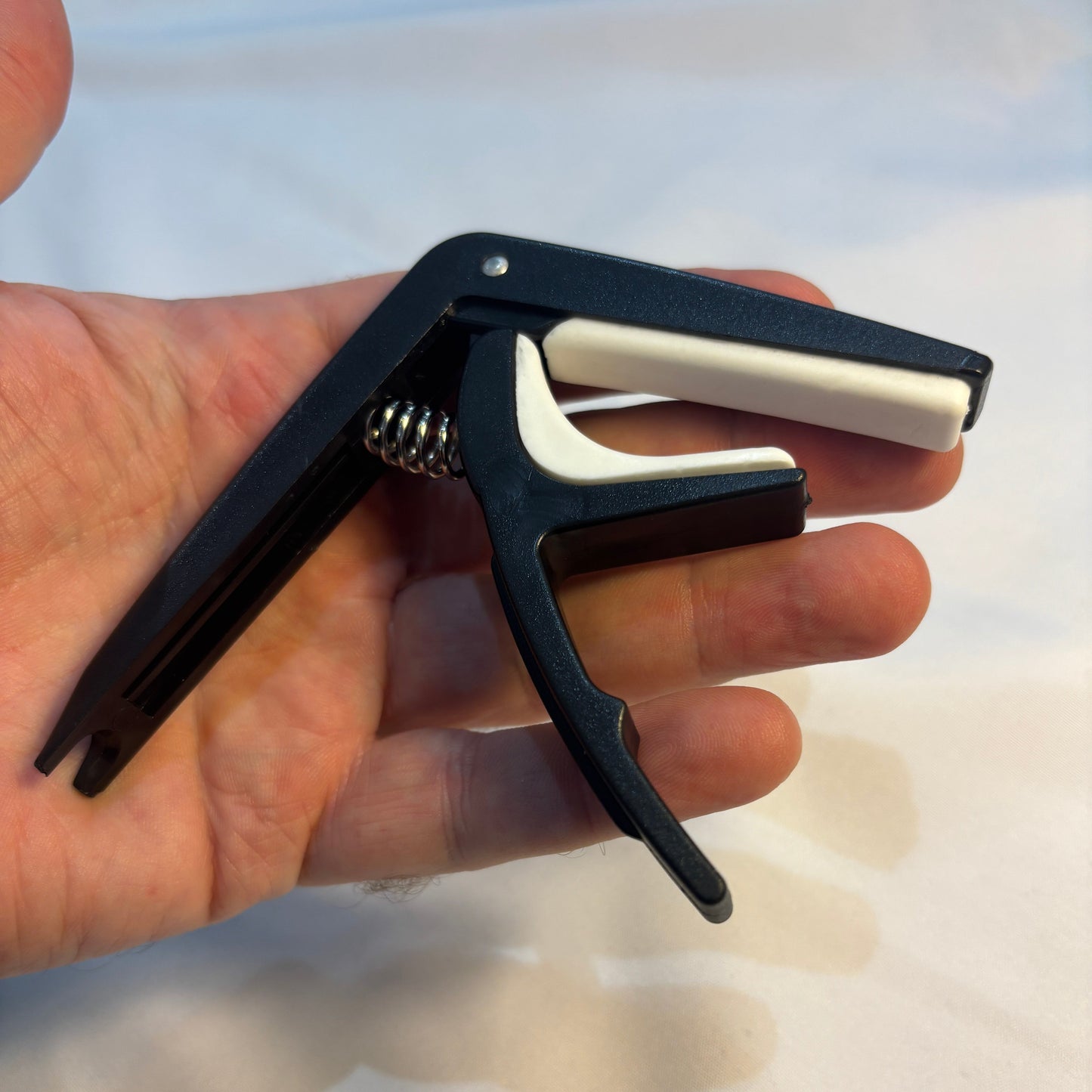 Budget Plastic Trigger Action Guitar Capo - Lightweight, Black, Travel-Friendly | Guitars Limited