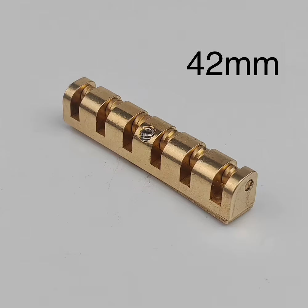 42mm brass electric guitar roller nut on a white background.