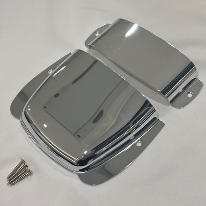 Chrome Bass Guitar Bridge and Pickup Covers photographed from the side on a White background.