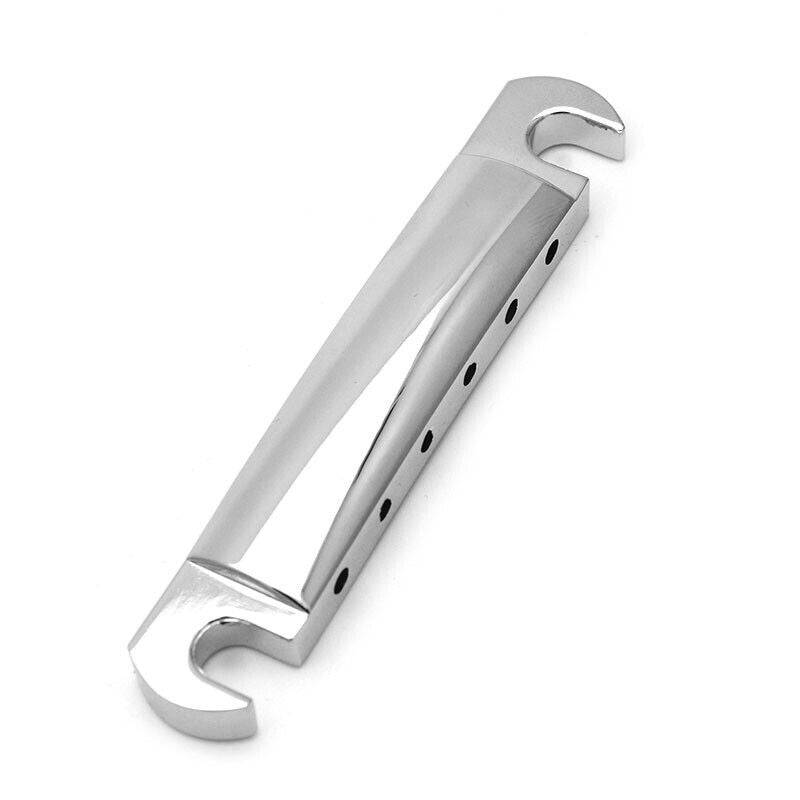 Electric guitar tailbar in chrome colour on a white background.