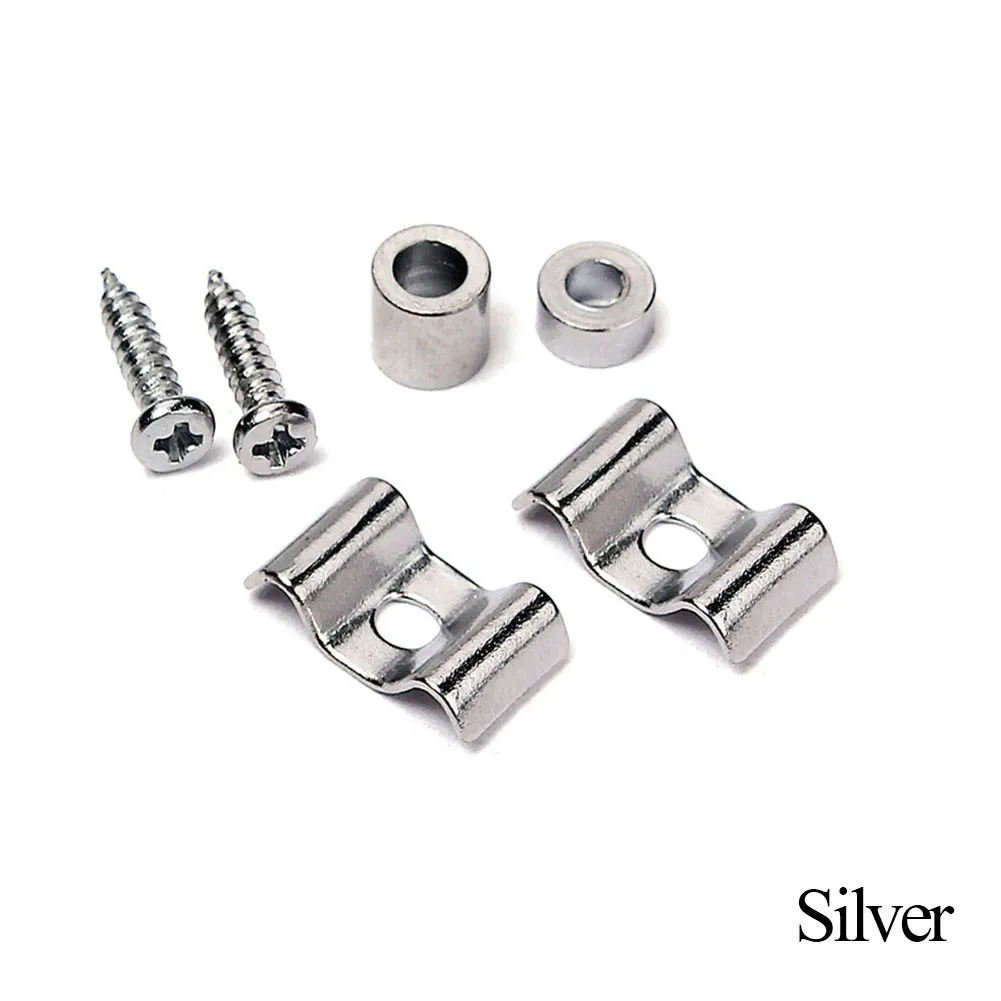 A pair of Chrome Guitar String Trees / Retainers on a White background.