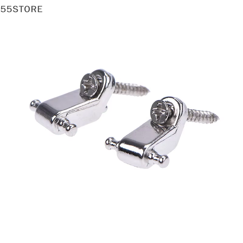 Two Chrome Guitar String Trees on a white background