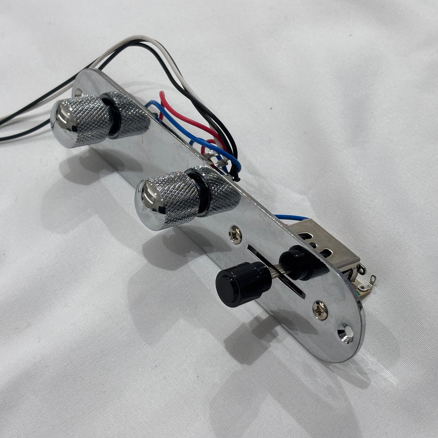 Chrome loaded  TL-style Control Plate against a white background.