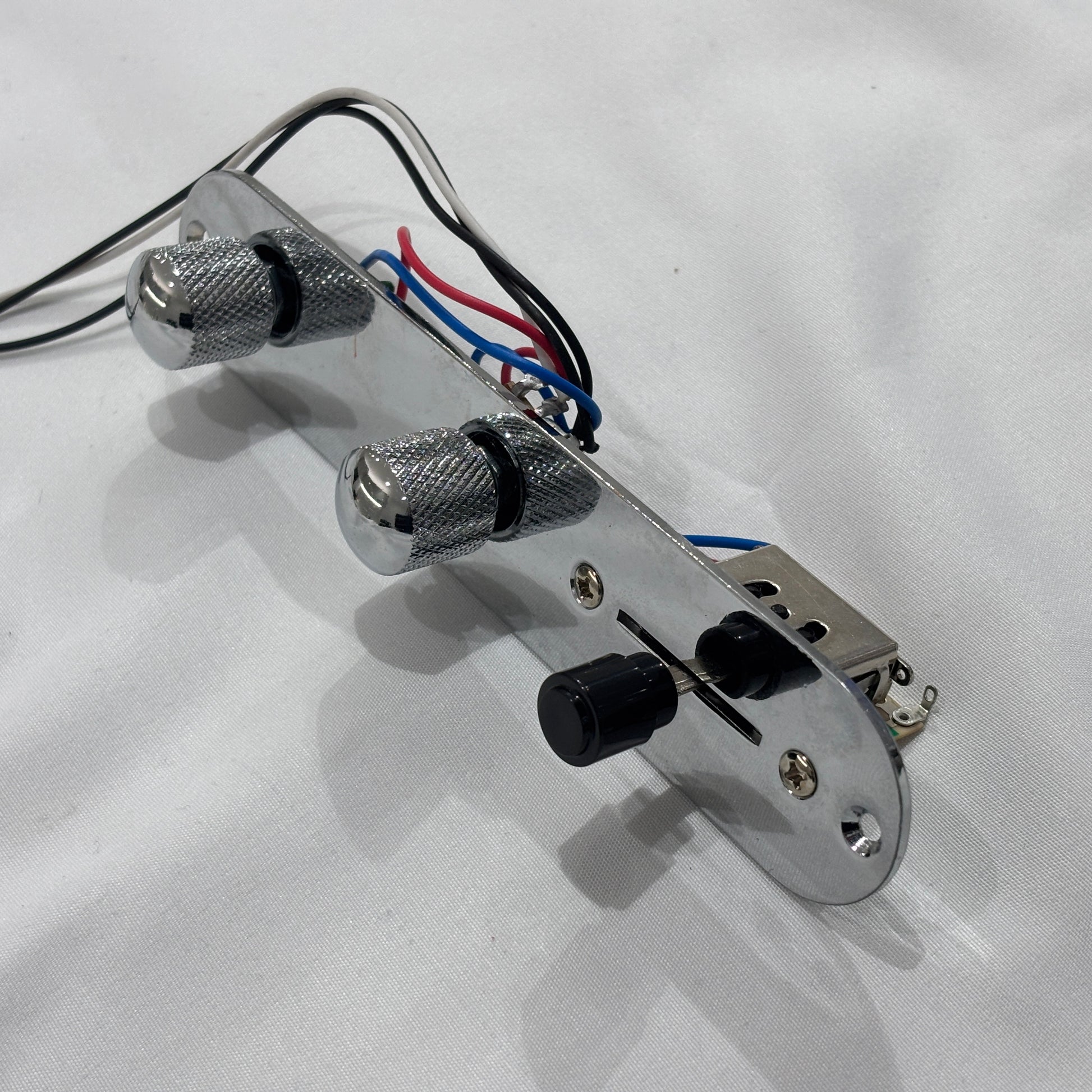 Chrome loaded  TL-style Control Plate against a white background.