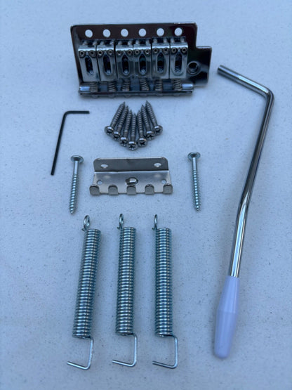 Chrome Tremolo Guitar Bridge Kit, ST-style, on a white background.