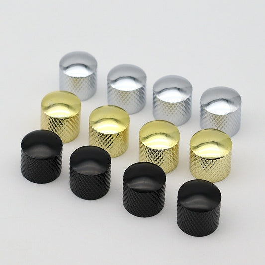 Electric guitar control knobs in Gold, Chrome and Black, TL-style, on a white background.