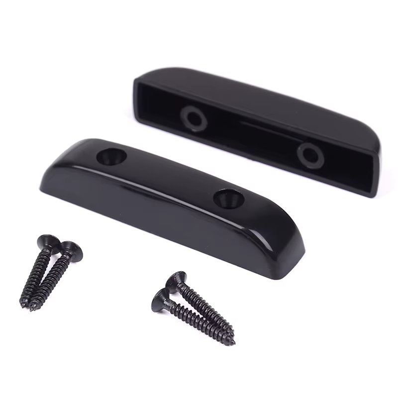 Two Black Electric Bass Guitar Thumb Rests (Tug Bars)  with screws on a white background.