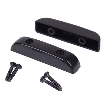 Two Black Electric Bass Guitar Thumb Rests (Tug Bars)  with screws on a white background.