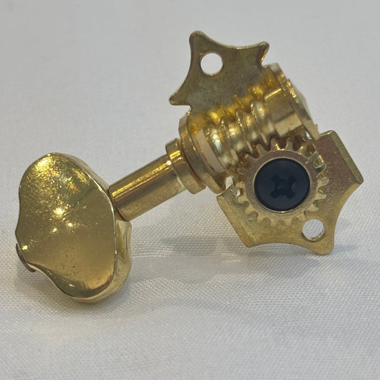 Gold Grover/Gotoh-style acoustic guitar vintage open back guitar tuner on a white background.