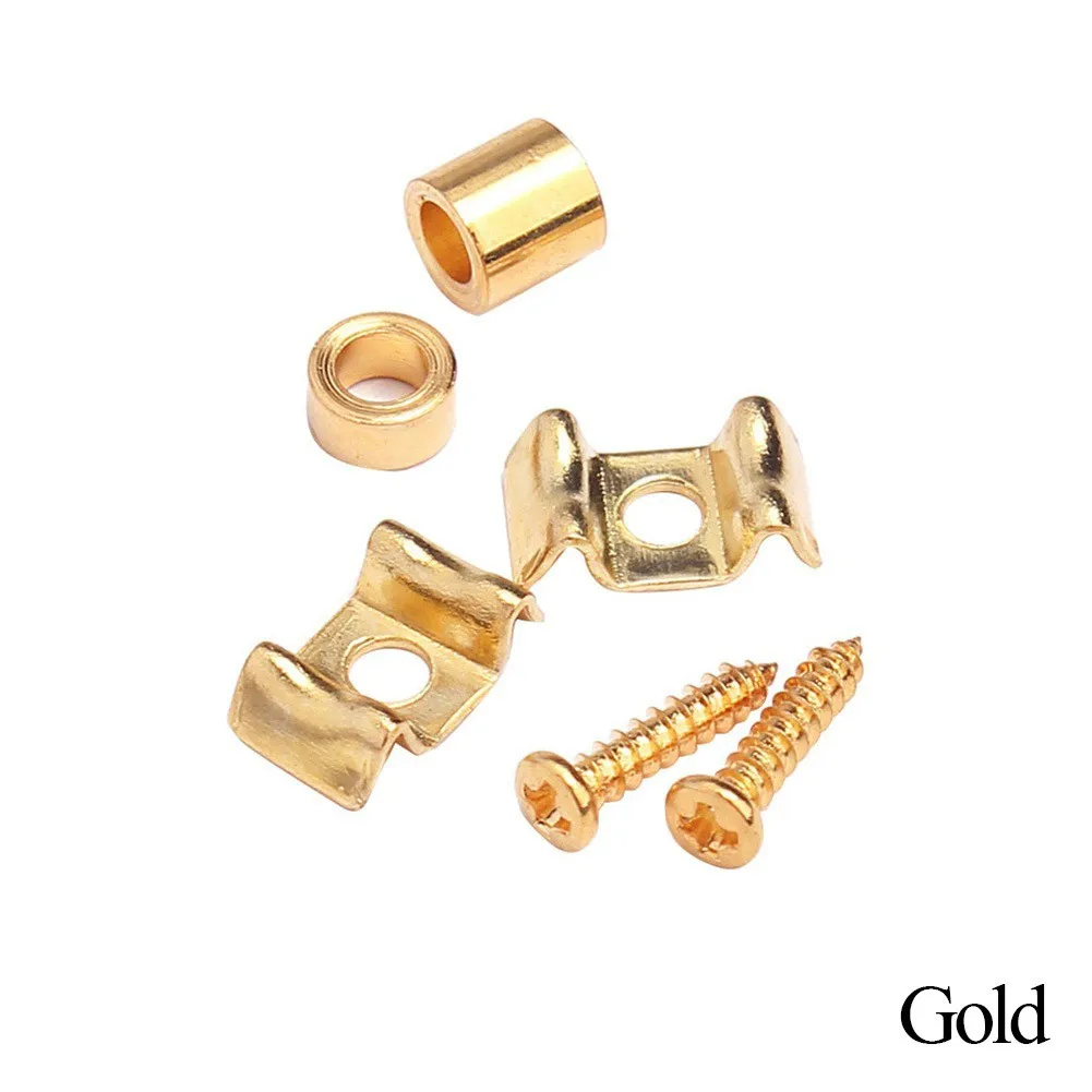 A pair of Gold Guitar String Trees / Retainers on a White background.