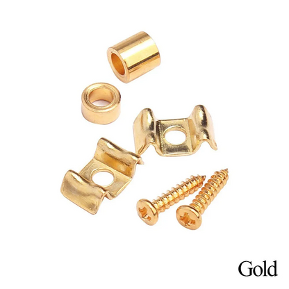 A pair of Gold Guitar String Trees / Retainers on a White background.