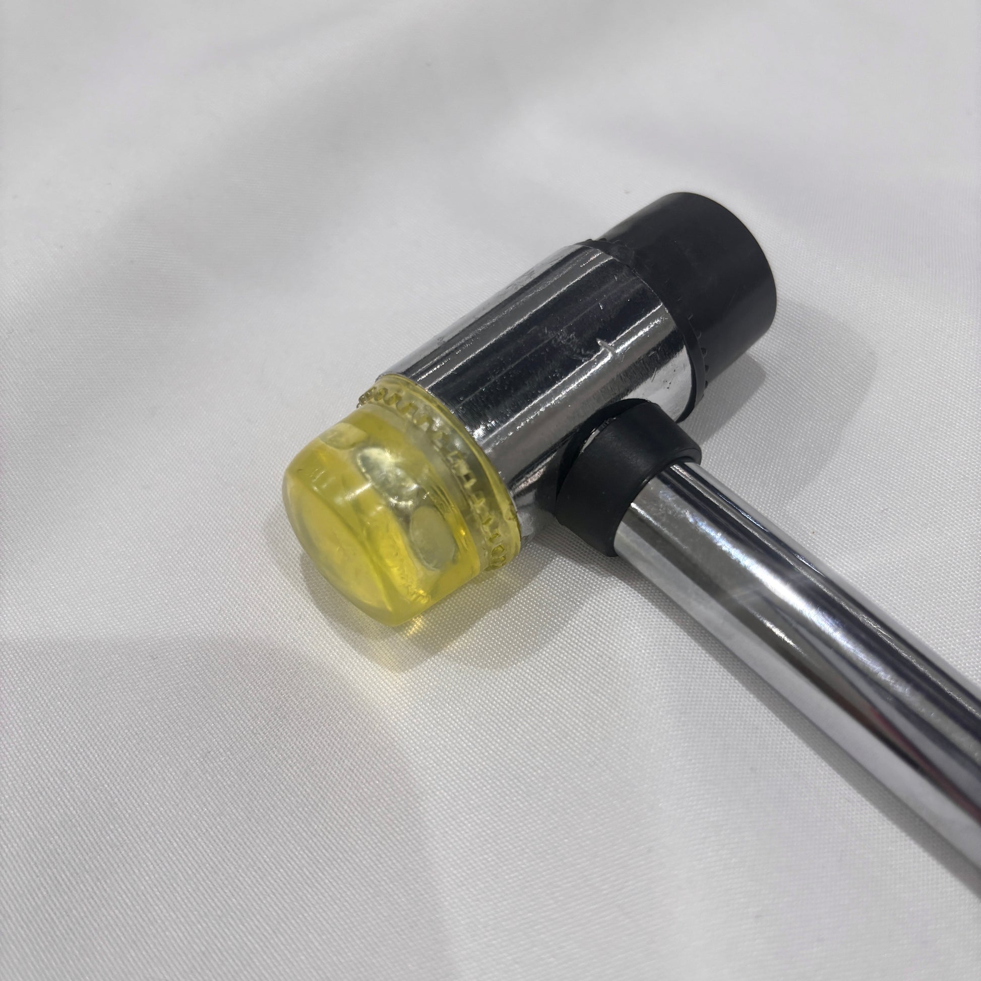 Guitar Fret Hammer rounded head on a White background.