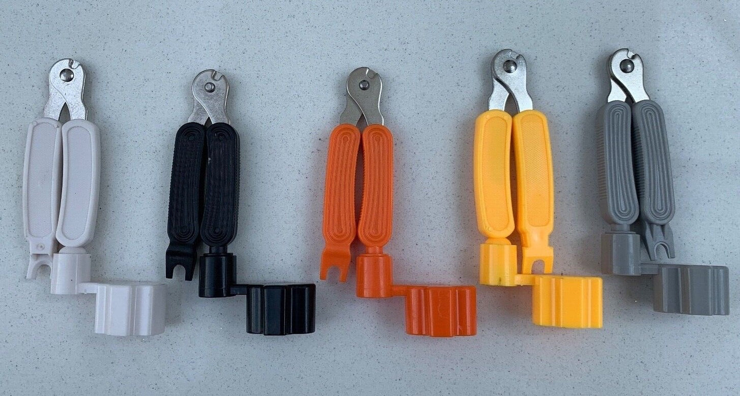 Five Guitar Multi Tools in different colours against a light grey background.