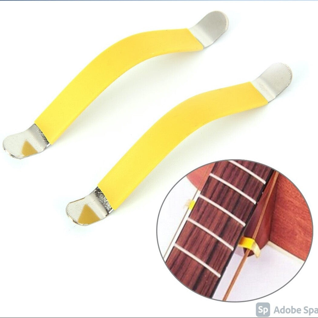 A pair of Guitar String Spreaders with an inset photo showing them in use on a a guitar.
