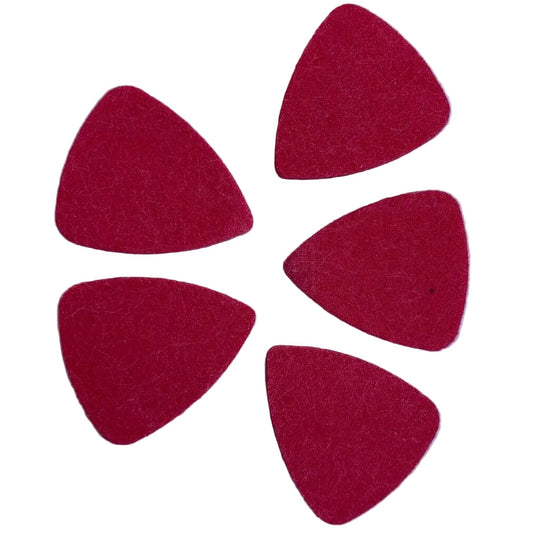 Five Red Felt Ukulele Plectrums / Picks photographed on a light grey surface.