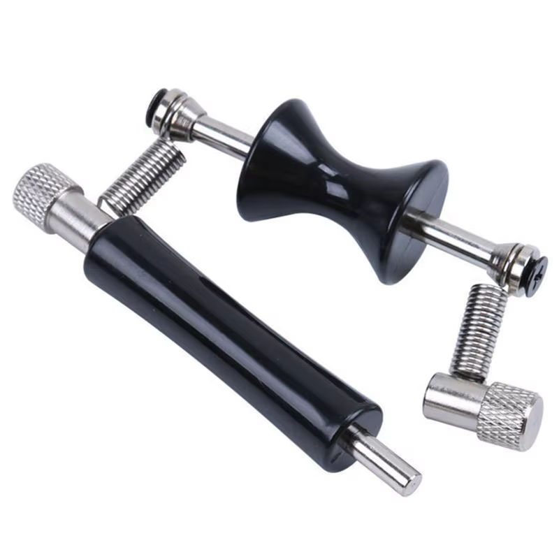 Rolling Guitar Capo photographed on a white background.