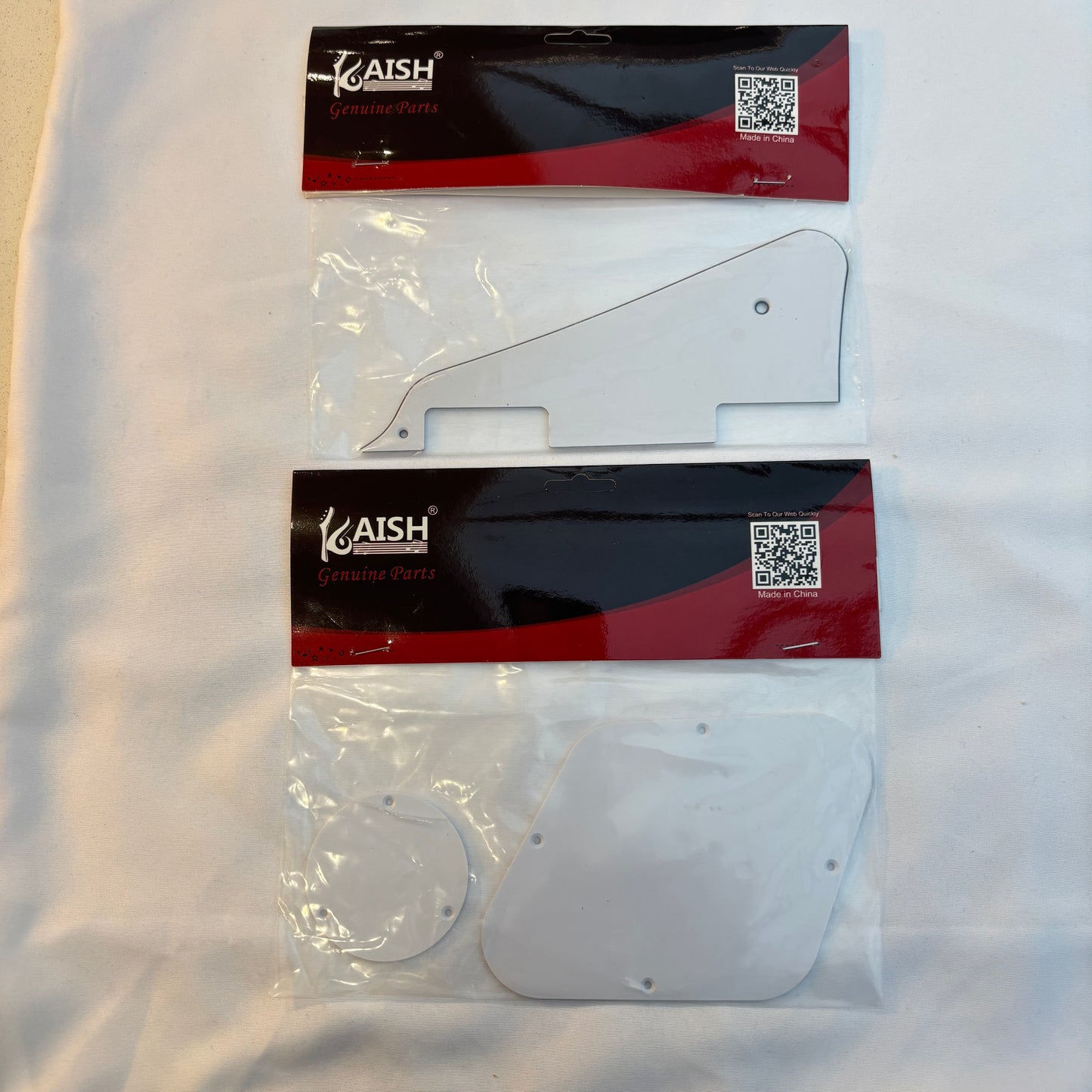 White pickguard set, LP-compatible, on a white surface.