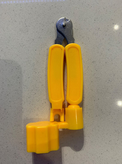 Yellow Guitar Multi Tool against a light grey background.